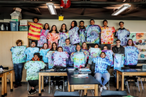 Students tie dyed t-shirts with the technique of their choice in Art 2 class.